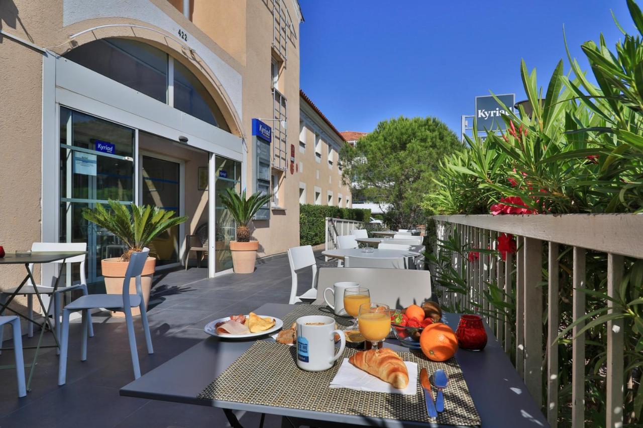Hotel Restaurant Kyriad Frejus Bagian luar foto