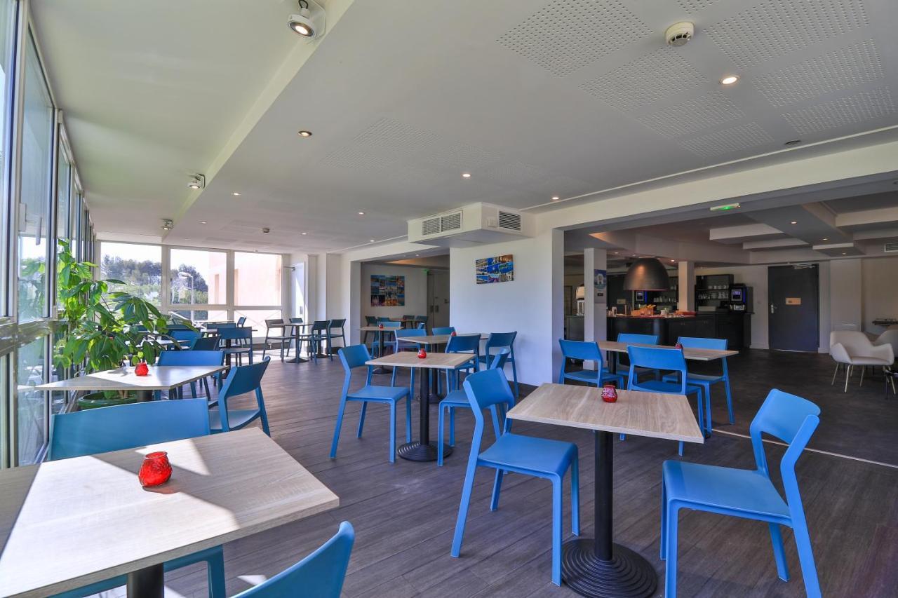 Hotel Restaurant Kyriad Frejus Bagian luar foto