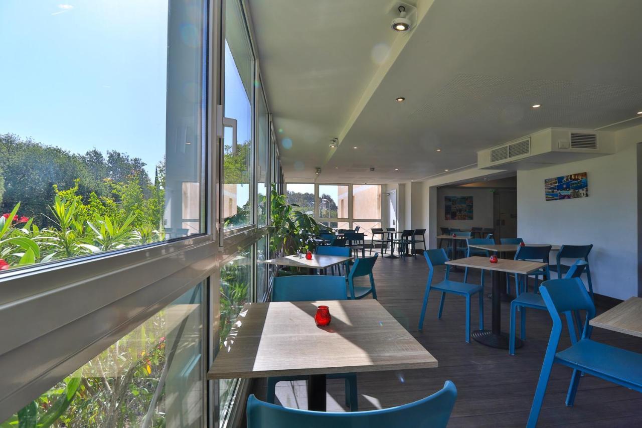 Hotel Restaurant Kyriad Frejus Bagian luar foto